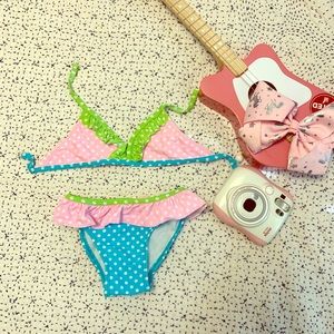 Fun little girl’s two piece polka dot swim suit!